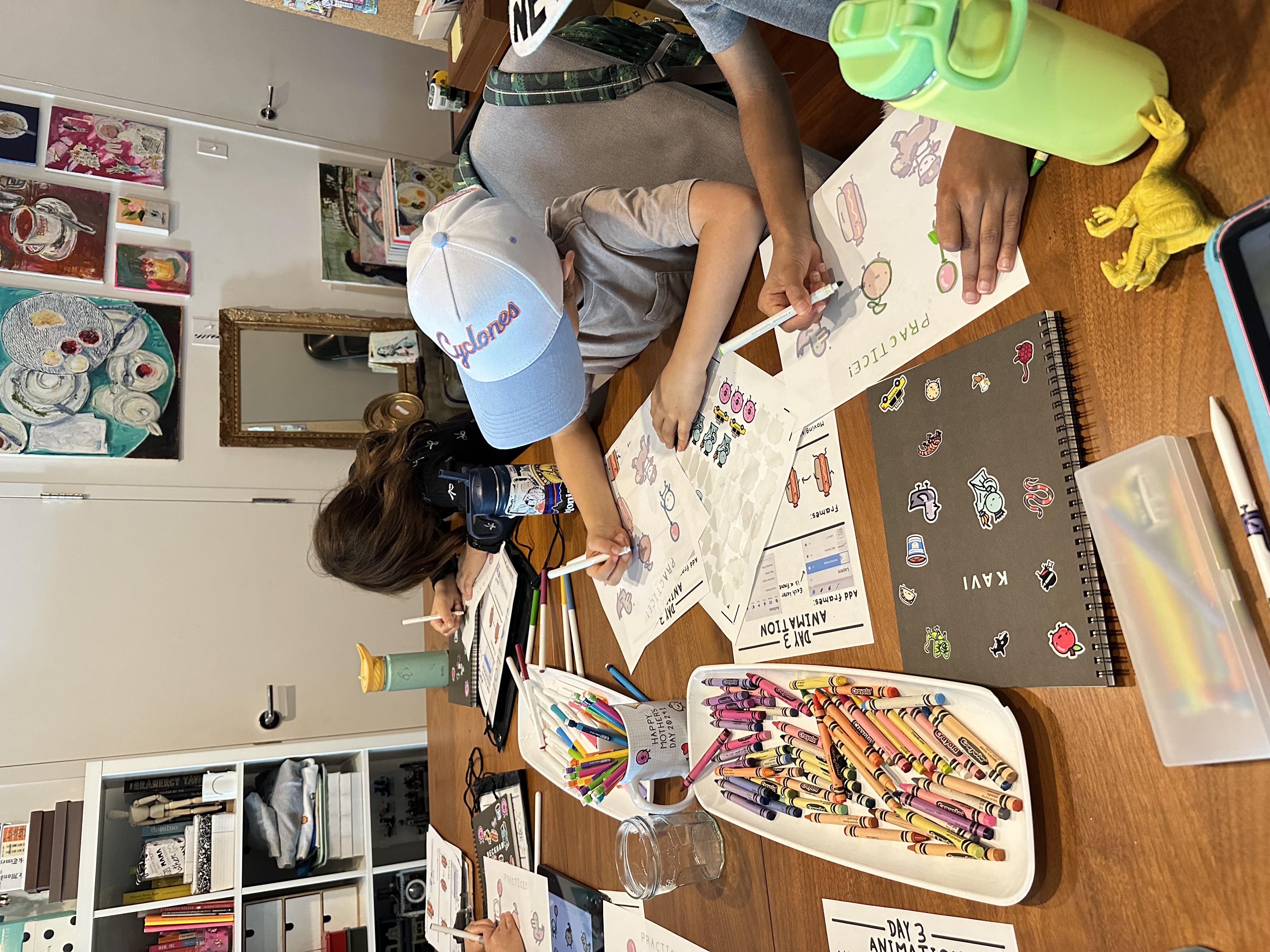 Students drawing animation worksheets